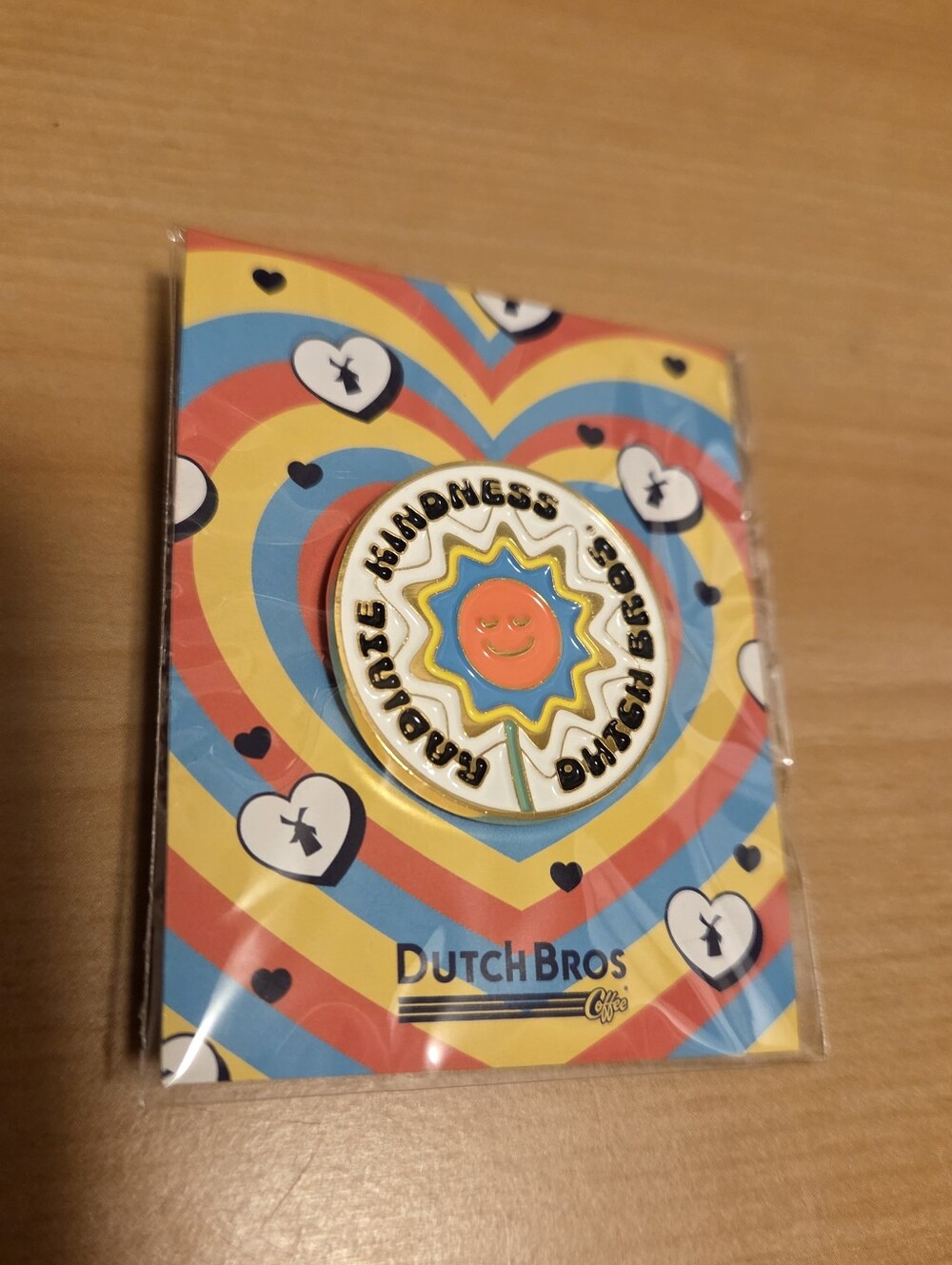Dutch Bros Exclusive Radiate Kindness Pin sealed